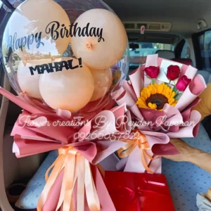 Birthday Balloon, Red Ribbon Cake, and Sunflower with Three Roses Bouquet